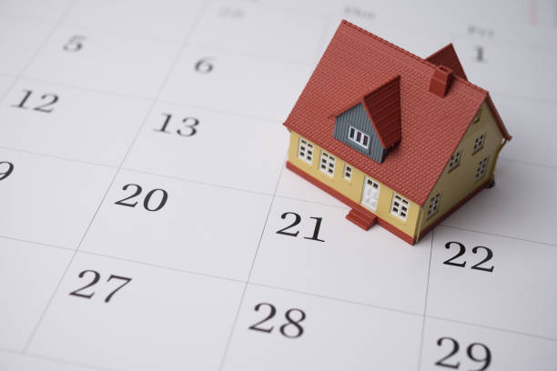 istock House on blank white calendar background copy space. 2179572829