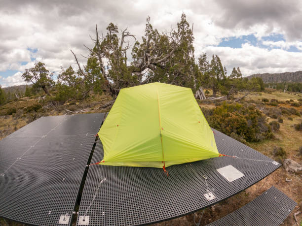 istock Ten pitched on platform in the wild, trekking concept 2179576238
