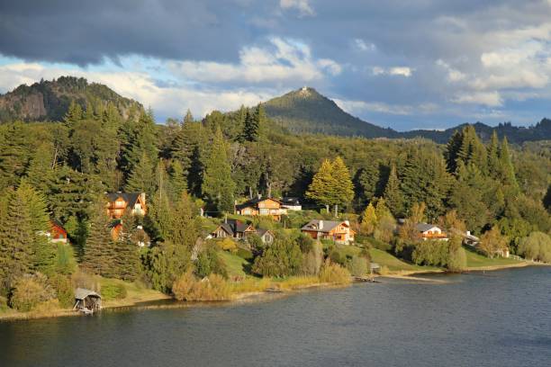 istock Moreno lake coastline with houses and forest 2179577219