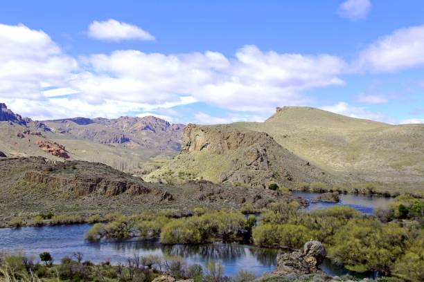 istock Gray mountains and blue sky with white clouds 2179577220