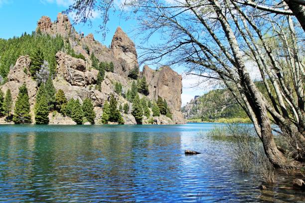 istock Rocky hill aside blue water river 2179577887
