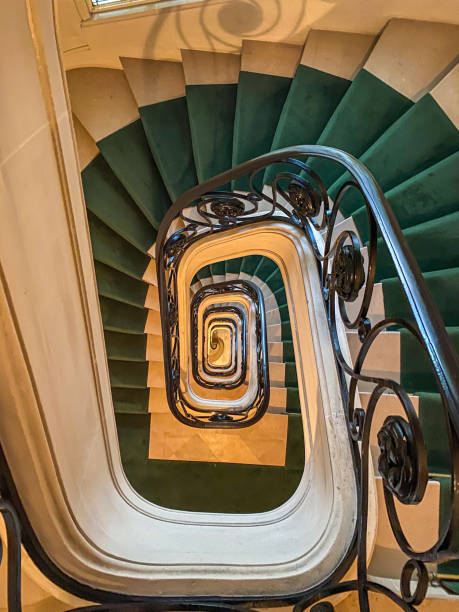 istock Green carpet on stairs 2179583481