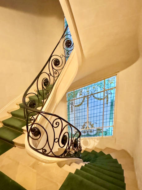 istock Architectural stairs with green carpet 2179586512