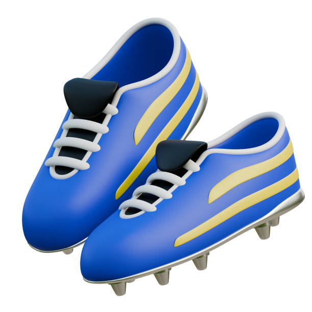 Detail of a black football boots with spikes. Blurred background of the national colors of one of the hosts of the summer worldwide football event. Grainy image. Copy space.