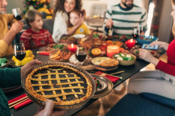 istock Family enjoy Christmas lunch together 2179596777