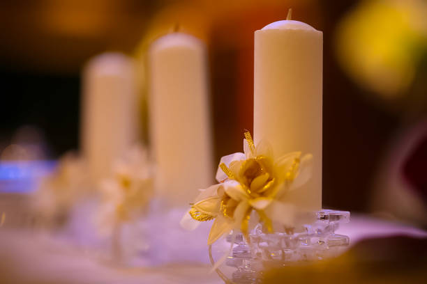 istock Stunning array of glowing candles forming rows and casting warm light, ideal for creating a peaceful and spiritual ambiance. Perfect for meditation, reflection, or romantic settings 2179599300