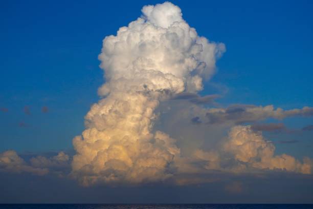 istock A huge cloud rises above the sea horizon. 2179601374