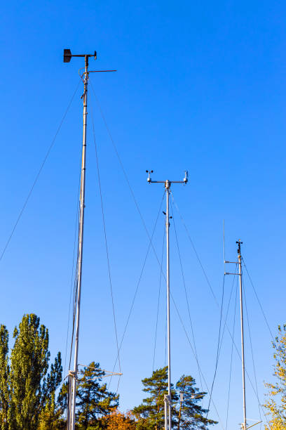 weather station with wind speed and direction sensor. meteorological equipment for wind control. anemometer and rhumbometer. weather forecast. vertical photo
