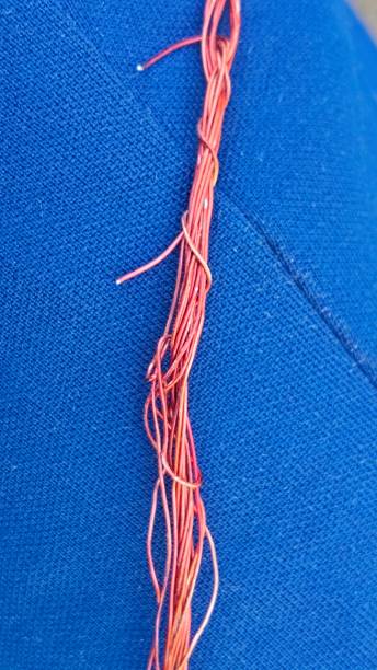 istock Close up photo of wire or cable  with blue background 2179617424