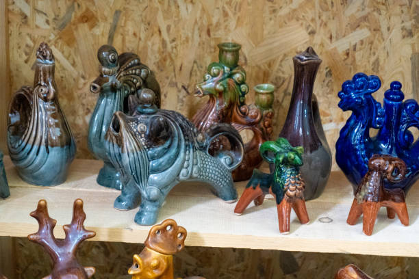 Decanter and figurines. Ukrainian dishes. Clay ceramics food plate decor painting. Set different utensil
