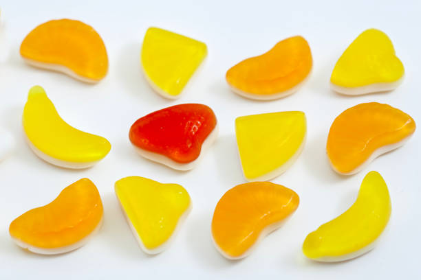 Fresh jelly fruit candies on the white background