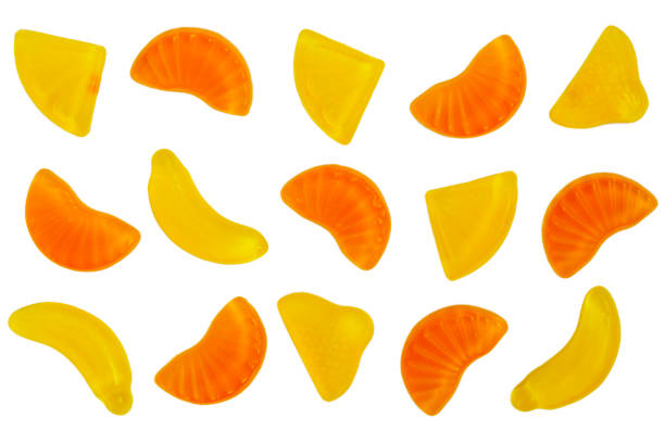 Fresh jelly fruit candies on the white background