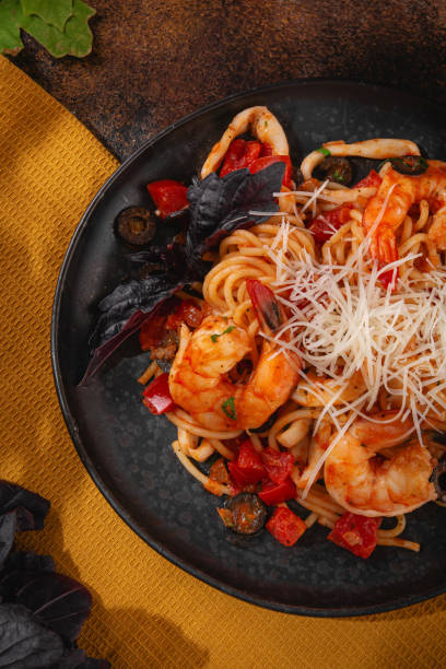 istock Russian cuisine. Pasta with shrimps and tomatoes 2179628650
