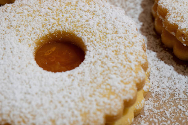istock Close-up of powdered sugar jam cookie 2179633229