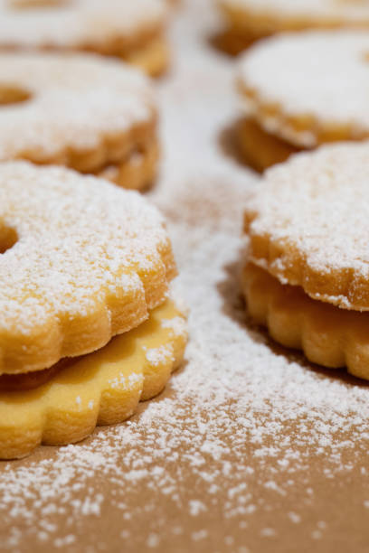 istock Stacked jam-filled cookies with powdered sugar 2179633231
