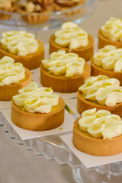 istock Lemon tart on the candy bar. Table with sweets, candies, dessert. 2179635347