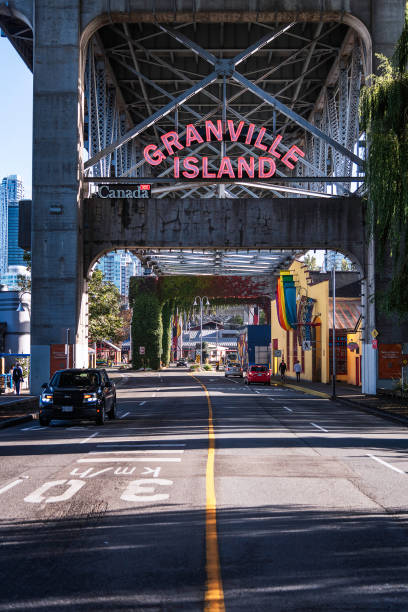 Granville Island Neon Sign Vancouver, British Columbia, Canada September 27, 2024: Street view of the Granville Island neon sign below the Granville Street Bridge in Vancouver, BC, Canada. granville island stock pictures, royalty-free photos & images