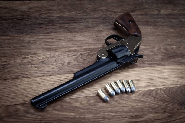 istock Old West .44 caliber single action revolver gun with rounds 2179643119