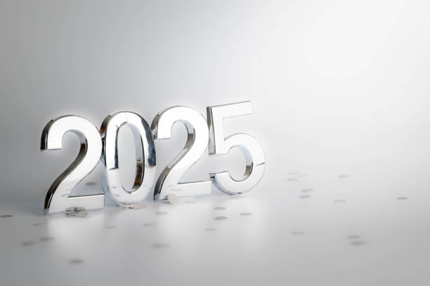 Silver 2025 and confetti, Happy New year celebration theme with silver, gray background.