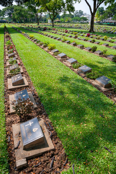 Kanchanaburi, Thailand - April 7, 2011: Kanchanaburi War Cemetery. The Kanchanaburi War Cemetery is the main prisoner of war cemetery for victims of Japanese imprisonment while building the Burma Railway.