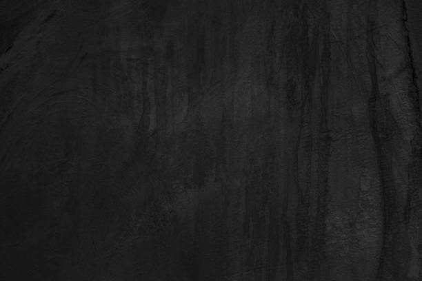 istock Black dark concrete wall background. Pattern board cement texture grunge dirty scratched for show anthracite promote product urban floor and abstract paper design element decor. Blackboard blank. 2179654194
