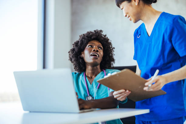 istock Healthcare Professionals Collaborating in a Modern Hospital Setting 2179654669