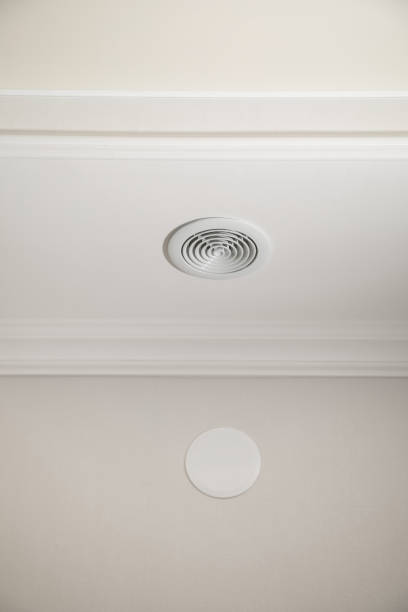 istock House ventilation system with holes in the ceiling. 2179669660