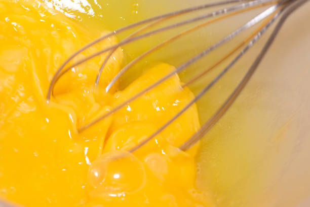 istock Hand whisk beating egg white and yolk 2179670743