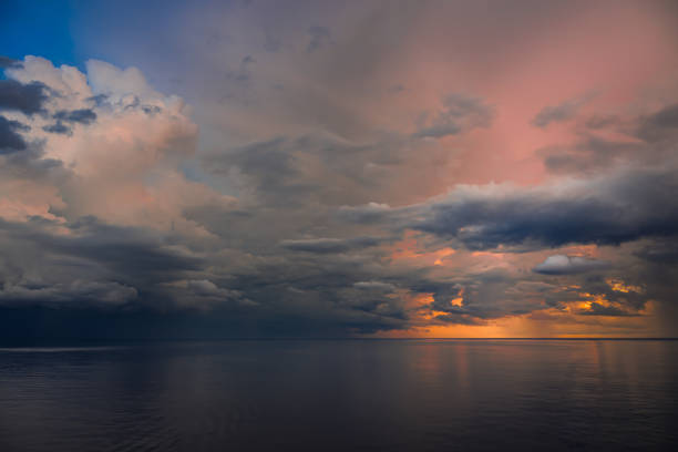 Golden dawn breaks over a serene Atlantic, welcoming a new day in peaceful beauty.