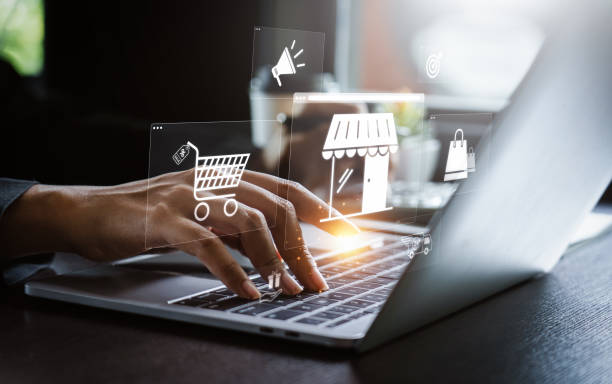 istock Person Managing E-Commerce Business and Online Shopping through Laptop, Featuring Digital Retail Strategies, Marketing, and Product Orders in a Modern Virtual Store Environment 2179679012