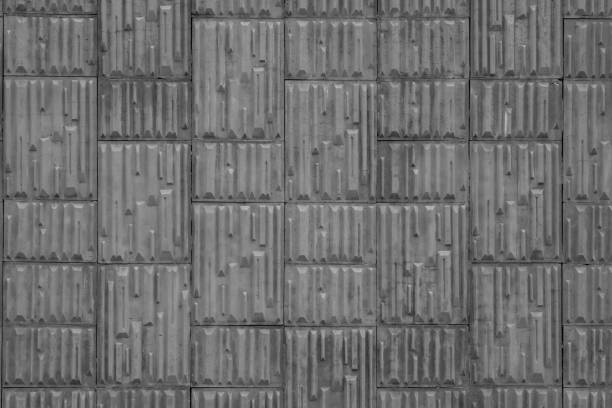 Concrete texture of the relief wall. Concrete gray background.