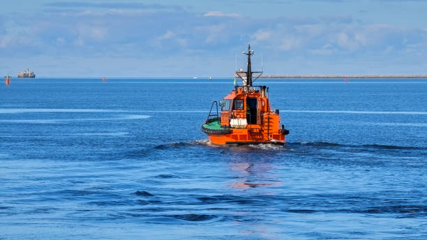 istock A pilot boat goes to meet a ship. 2179682623