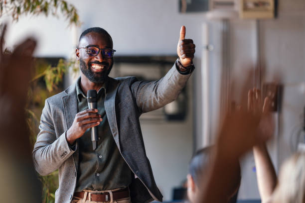 istock Confident Speaker Leading a Business Conference With Enthusiasm 2179684392