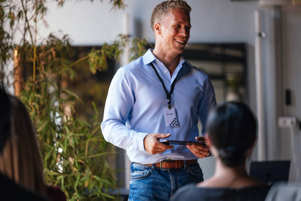 istock Business Speaker Engaging With Audience at Conference Event 2179684393