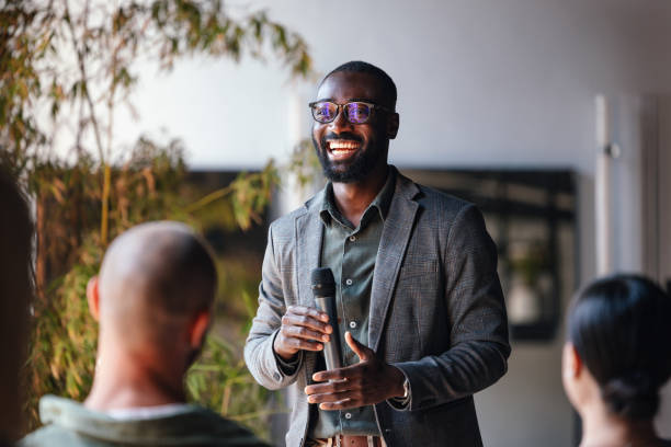 Confident Speaker Engaging Audience During Business Conference