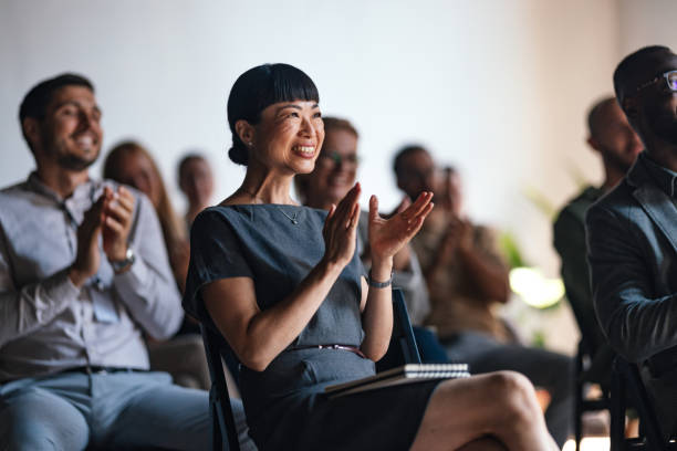 istock Joyful Audience Applauding at Business Conference Event 2179684446