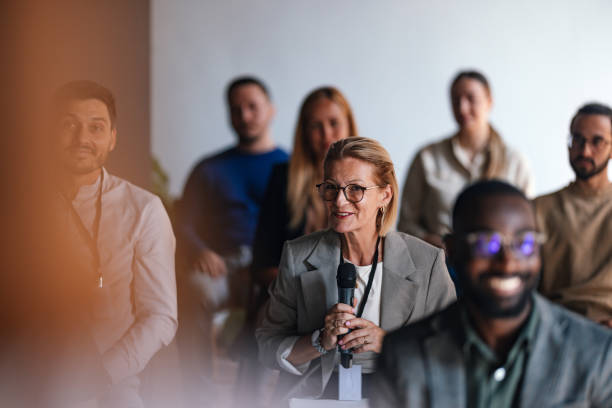 Engaged Audience at Business Conference with Motivated Speaker