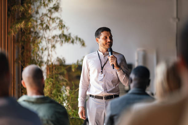 istock Business Speaker Engages Audience at a Professional Conference Event 2179684485