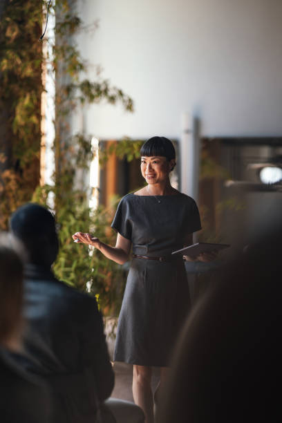 istock Confident Speaker Leading A Business Conference Presentation 2179684496