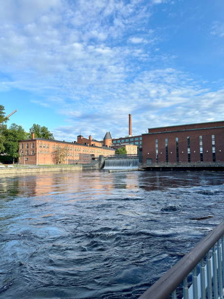 istock Historic Industrial Buildings by a Flowing River 2179695086