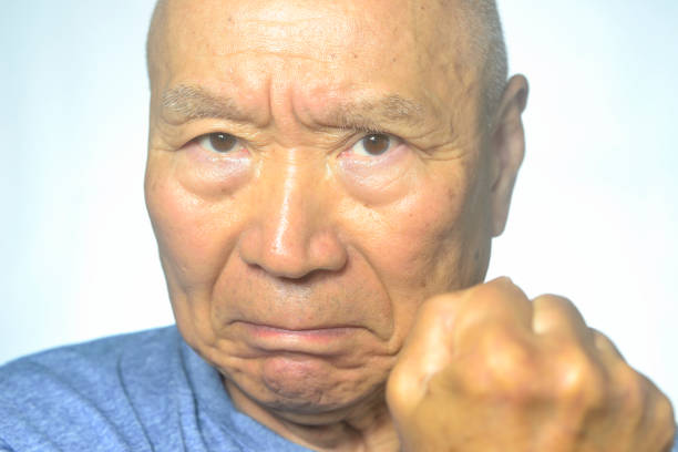 Close-up of an angry old man's face