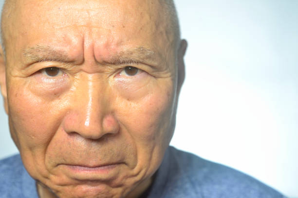 Close-up of an angry old man's face