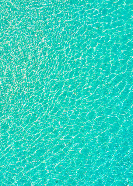 istock Aerial view of clear turquoise water creating ripples 2179700379