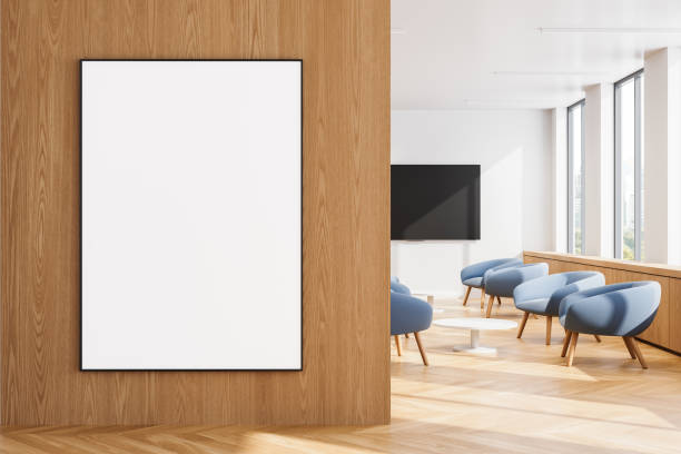 istock Modern office interior with blank poster on wooden wall. 3D Rendering 2179700891