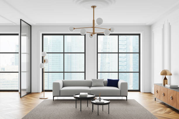 istock Modern home living room interior with couch and drawer, panoramic window 2179701890