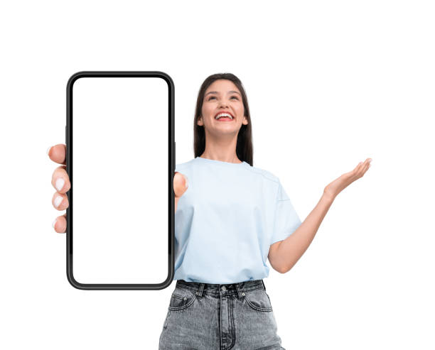 istock Smiling woman holding a smartphone with a blank screen on a white background. 2179701978