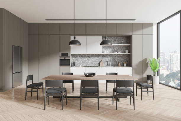 istock Modern kitchen interior with dining table and chairs in front of cabinets and shelves. 3D Rendering 2179702211