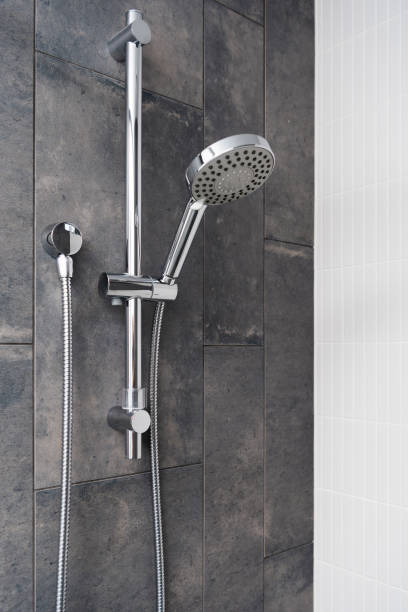 istock Silver shower head closeup in bathroom 2179703570