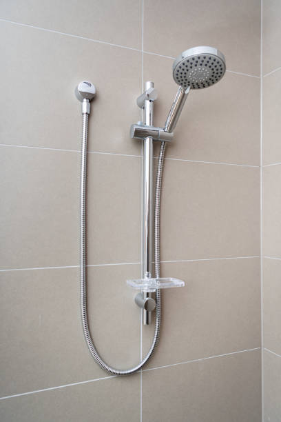 istock Silver shower head closeup in bathroom 2179703694