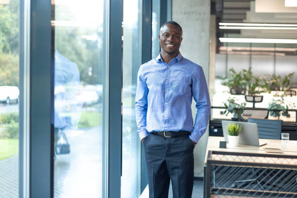 istock Young handsome african businessman smiling in an office environment 2179707235